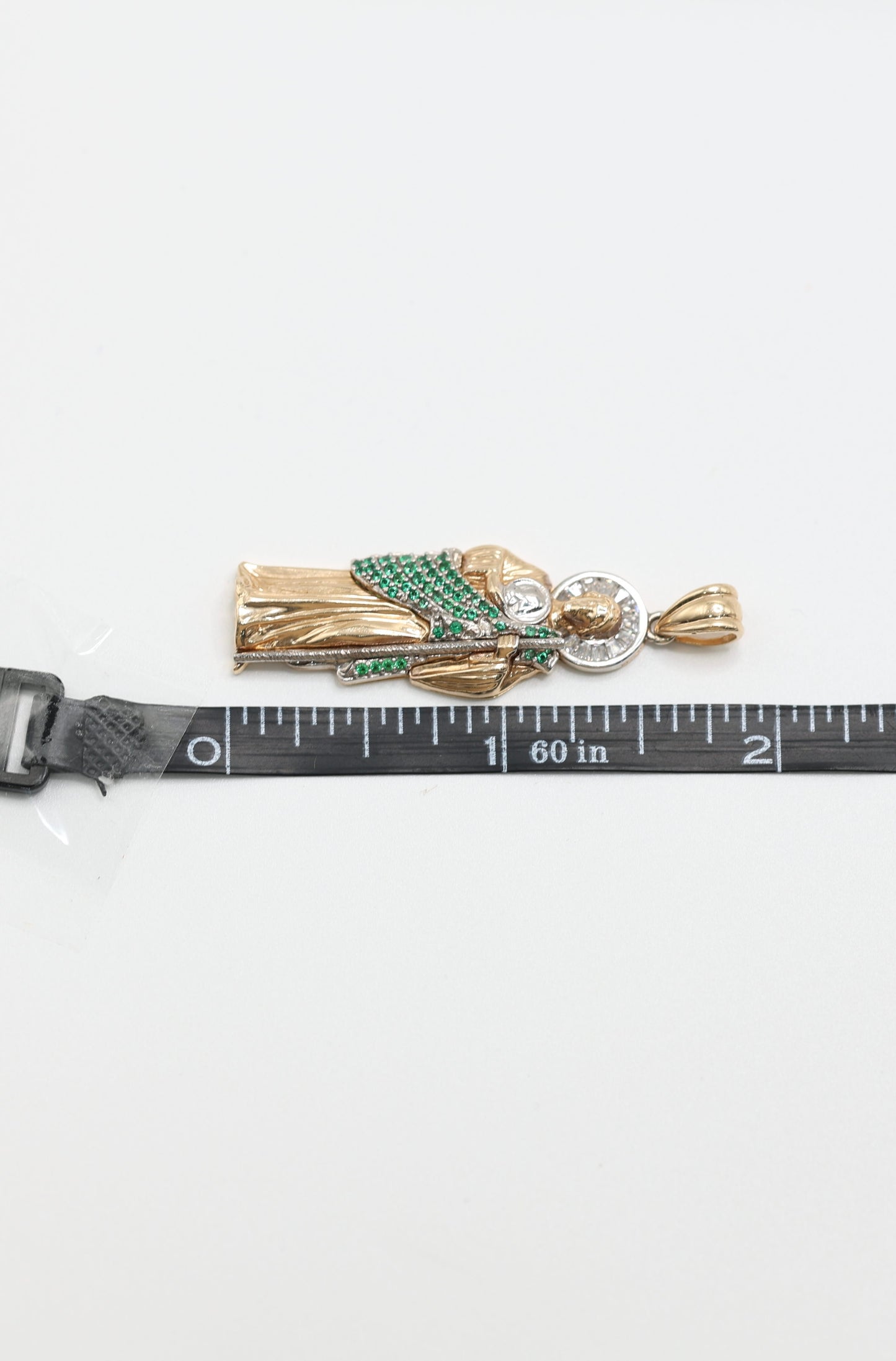 14KT GOLD SAN JUDAS PENDANT WITH GREEN STONES AND BAGUETTES