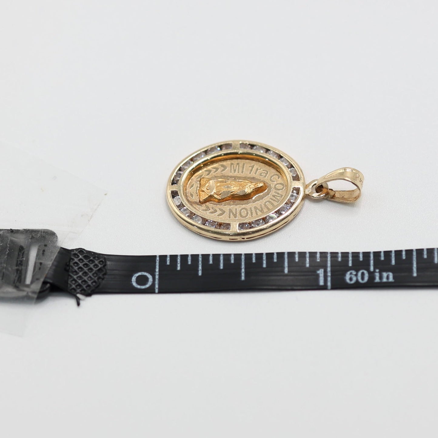 14KT GOLD "MI PRIMER COMUNION" OVAL PENDANT WITH CUBIC ZIRCONIA BORDER