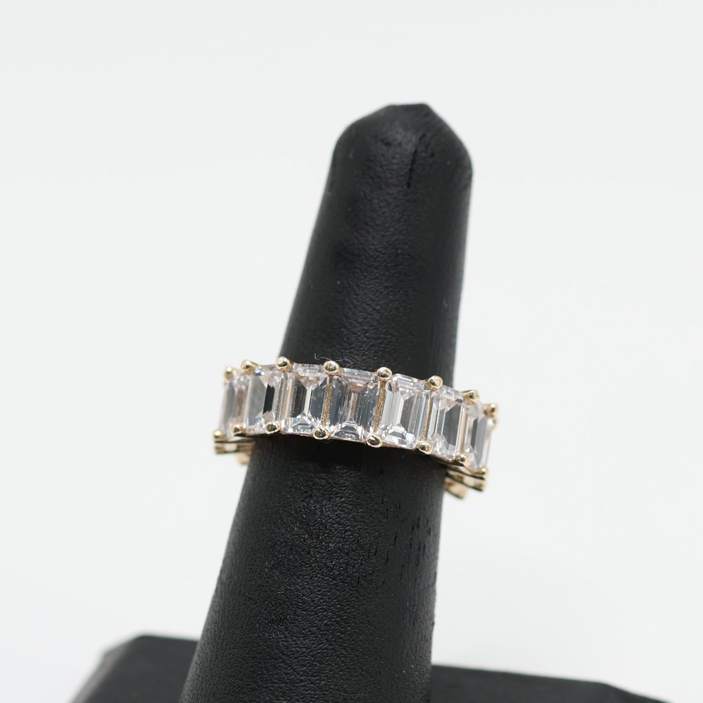 14KT GOLD ETERNITY EMERALD CUT CUBIC ZIRCONIA - SIZE 6
