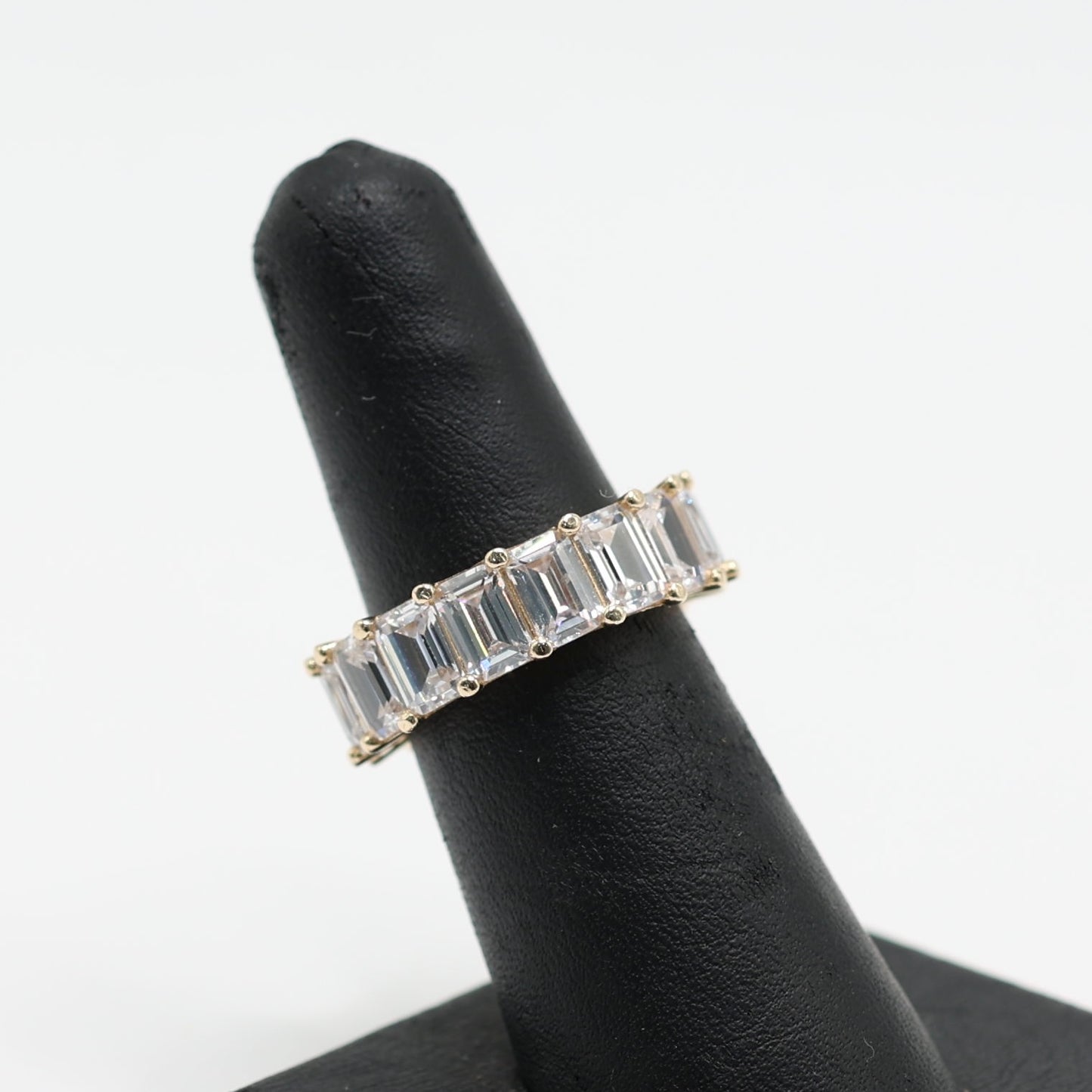 14KT GOLD ETERNITY EMERALD CUT CUBIC ZIRCONIA - SIZE 6