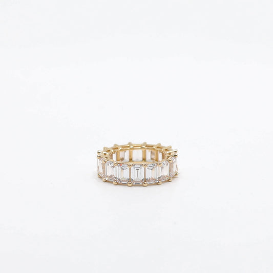 14KT GOLD ETERNITY EMERALD CUT CUBIC ZIRCONIA - SIZE 6