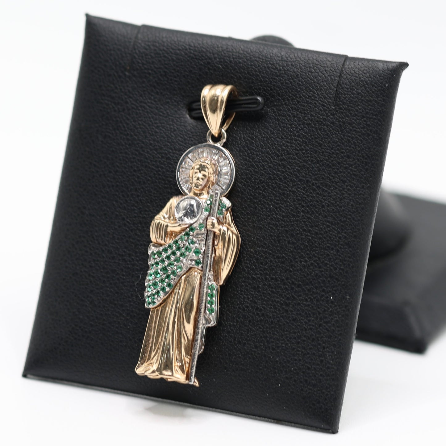 14KT GOLD SAN JUDAS PENDANT WITH GREEN STONES AND BAGUETTES