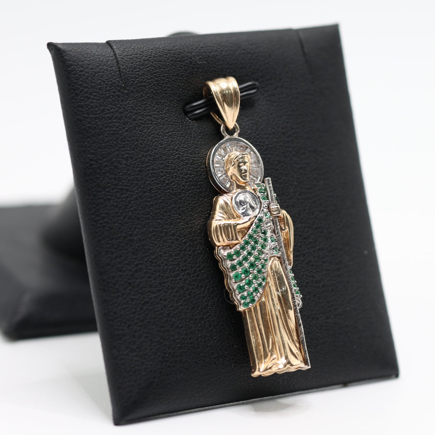 14KT GOLD SAN JUDAS PENDANT WITH GREEN STONES AND BAGUETTES
