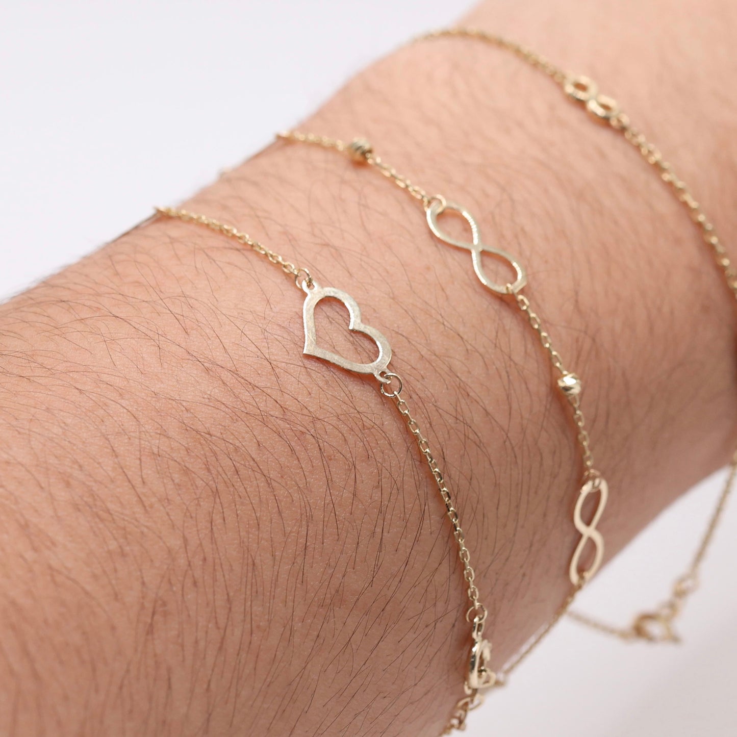 14KT GOLD DAINTY 4 HEART BRACELET