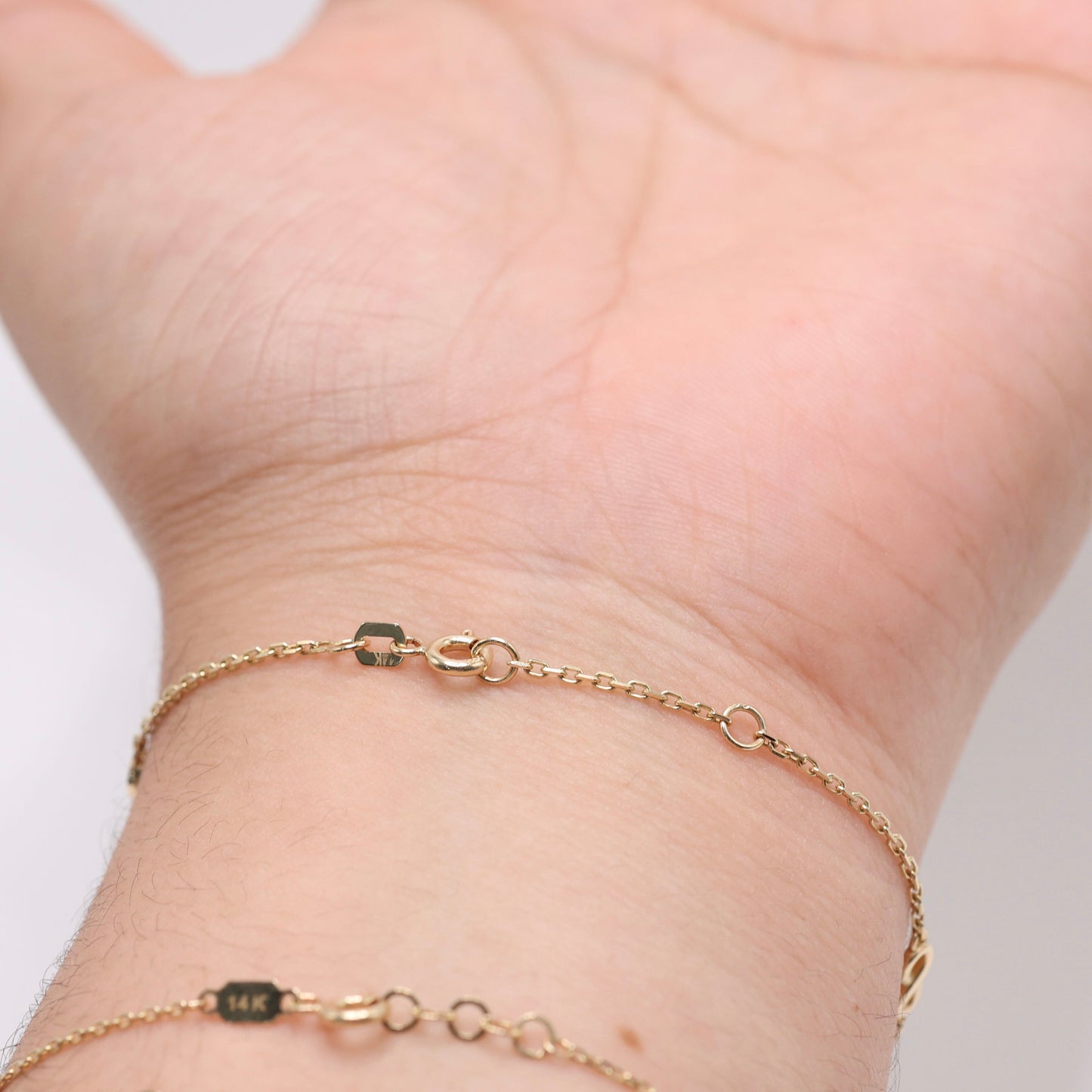14KT GOLD 4 SMALL INFINITY BRACELET