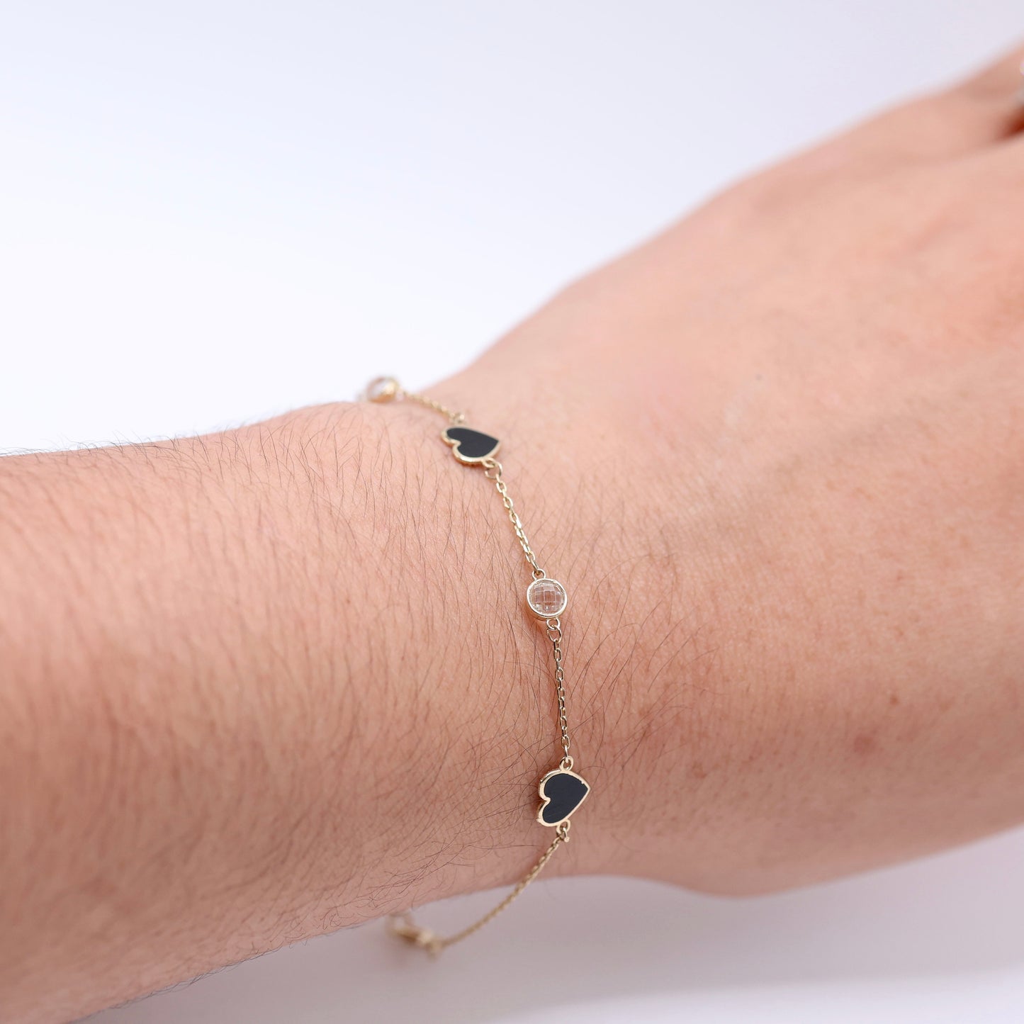 14KT GOLD DOUBLE SIDED  HEART BRACELET - BLACK & GOLD BURST SZ 7 W EXT 7.5