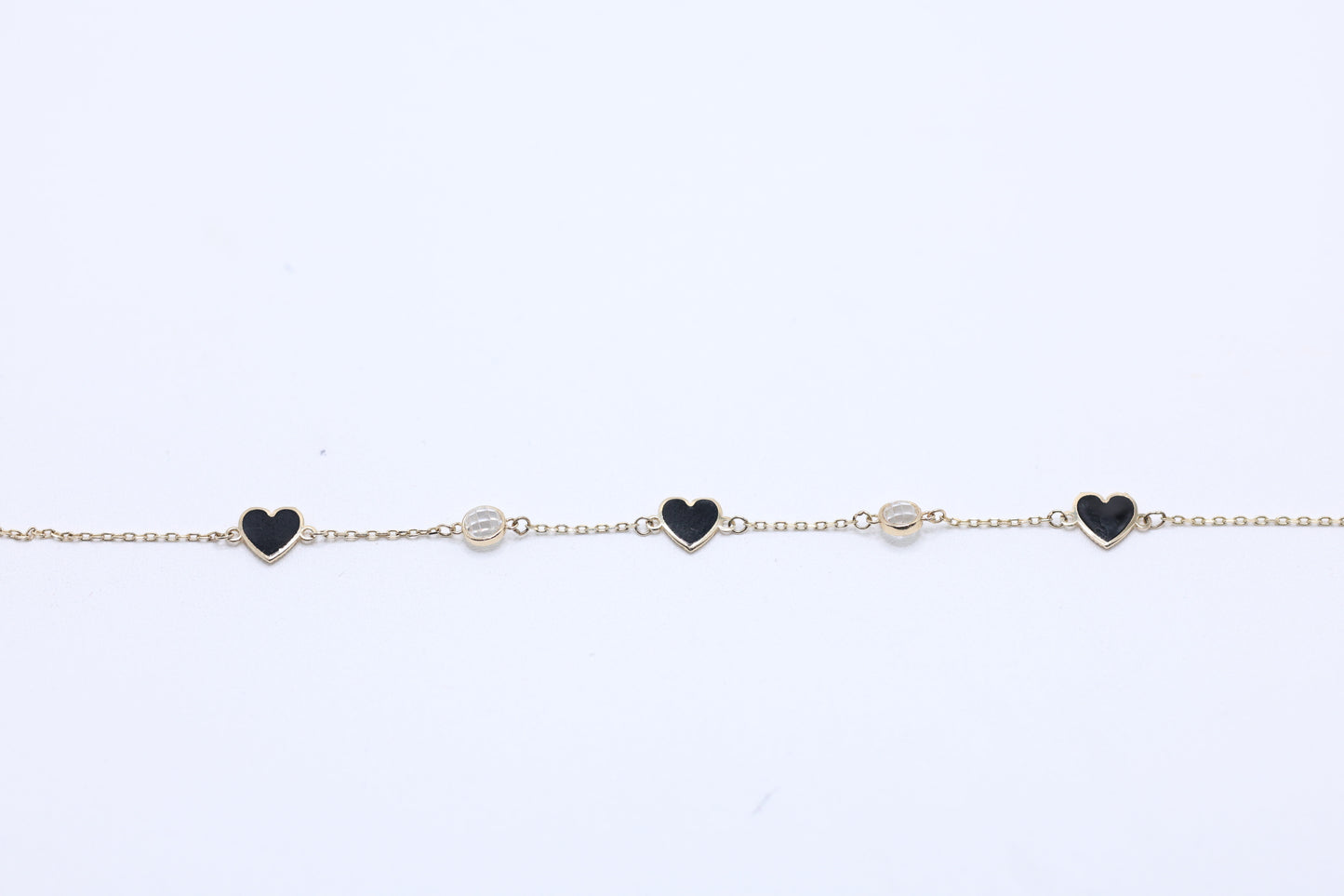 14KT GOLD DOUBLE SIDED  HEART BRACELET - BLACK & GOLD BURST SZ 7 W EXT 7.5