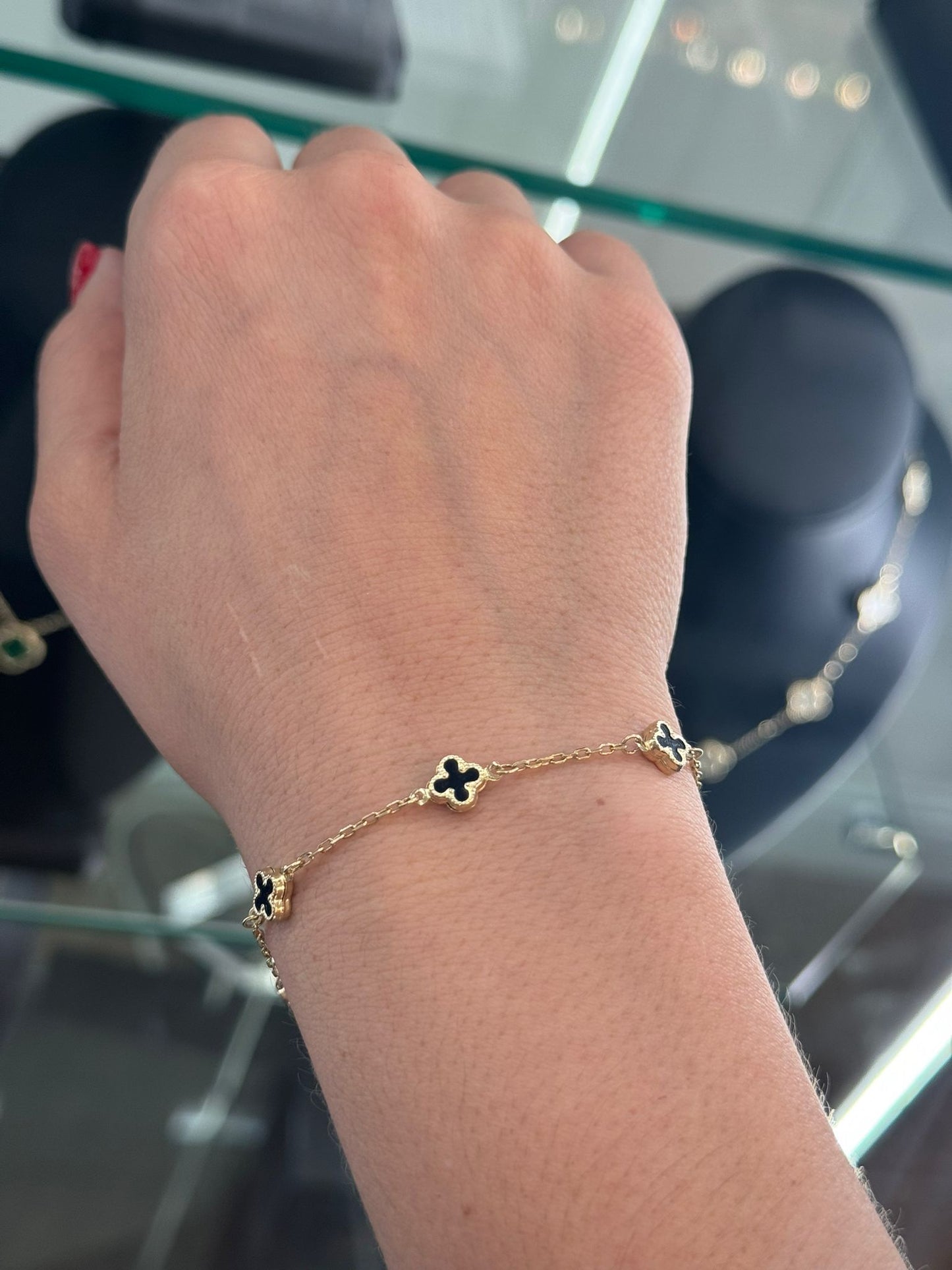 14K SMALL BLACK FLOWER BRACELET