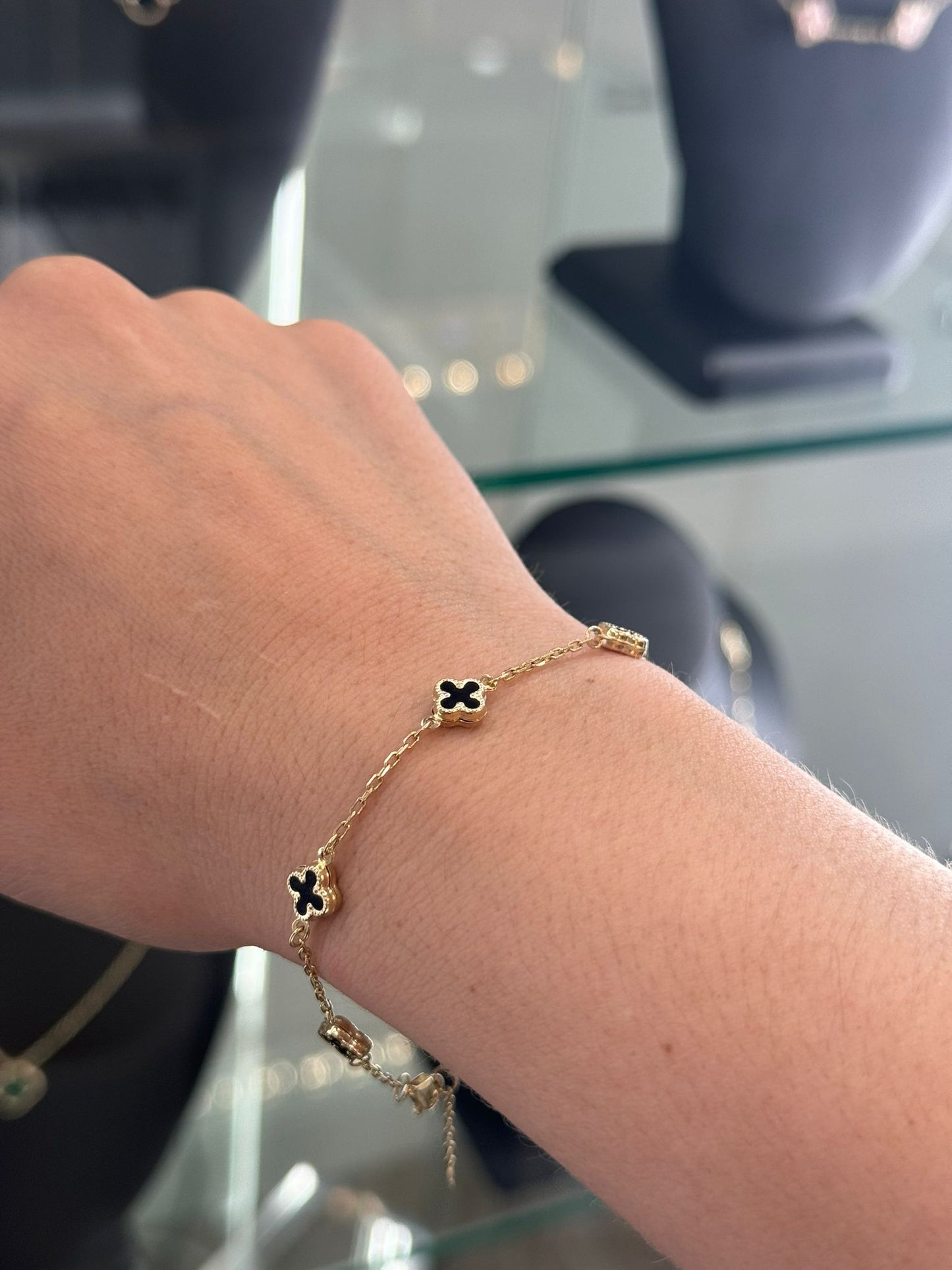 14K SMALL BLACK FLOWER BRACELET